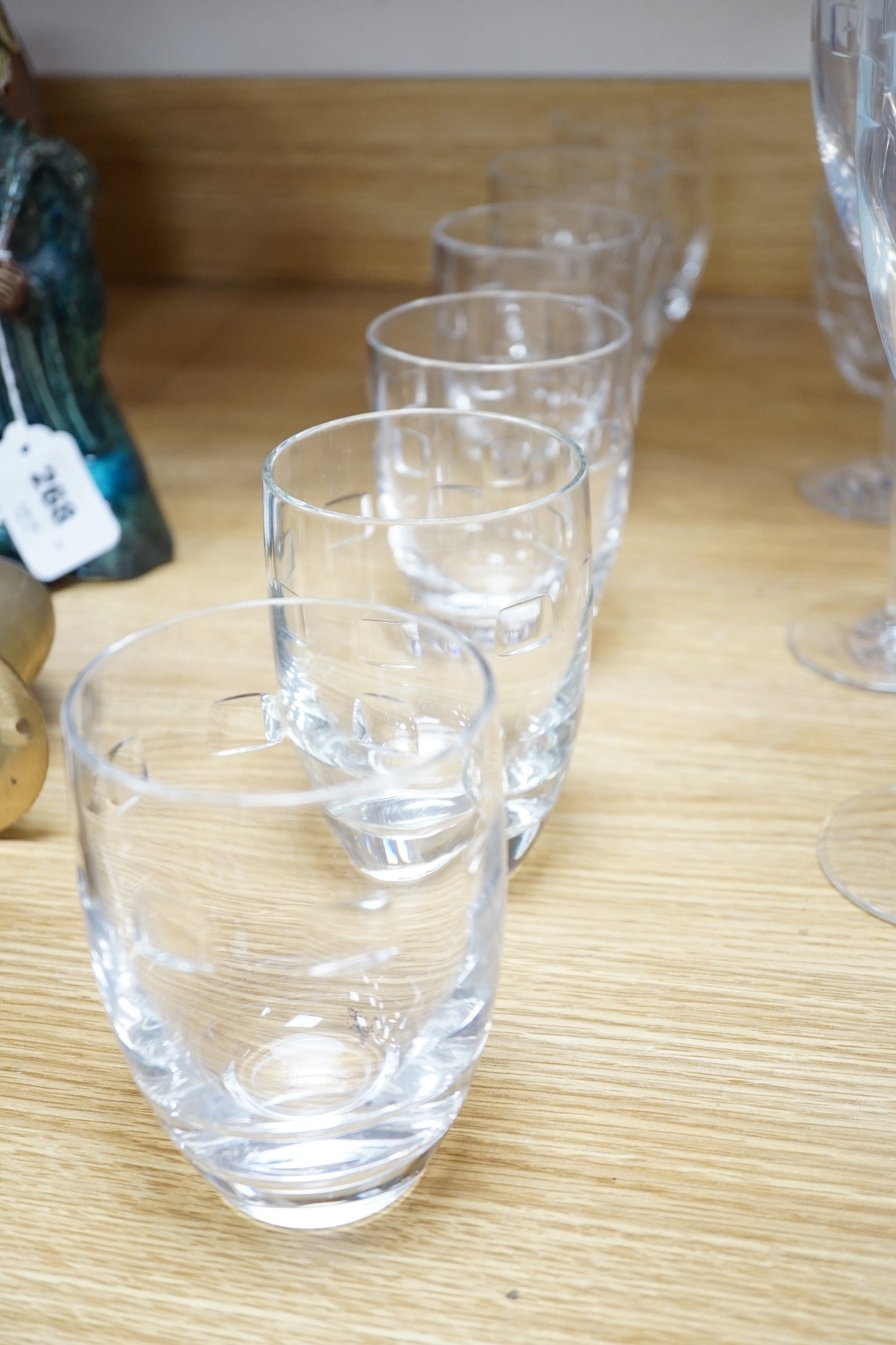 John Rocha for Waterford. A set of 8 cut glass flutes with six matching tumblers, three goblets and a carafe